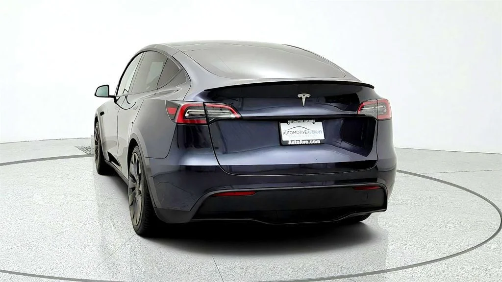 Used 2024 Stealth Grey Tesla Performance AWD w/ White & Black Interior image 6