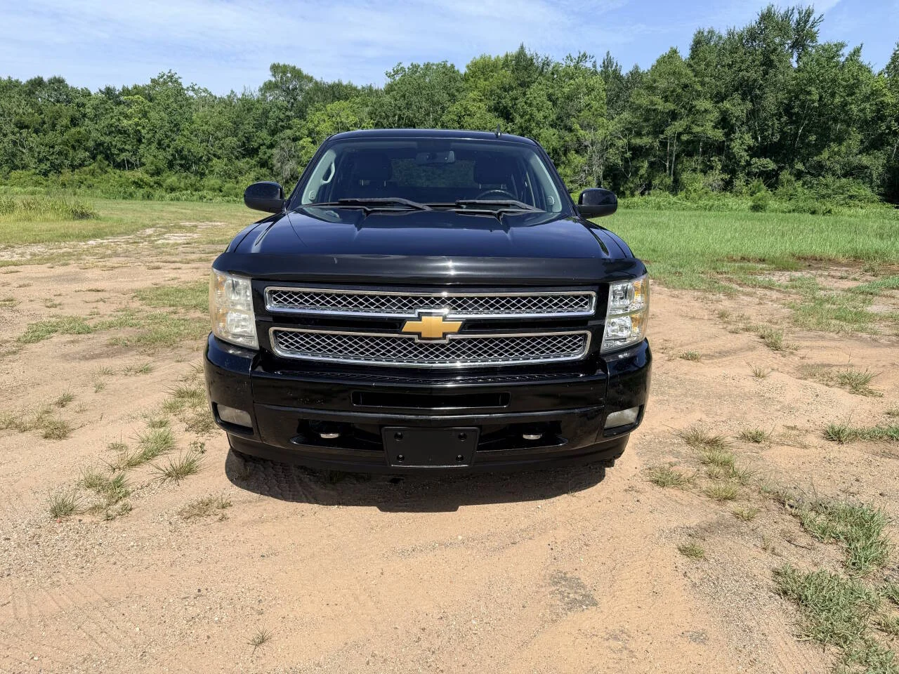 Used 2013 Black Chevrolet LTZ 4x4 4dr Crew Cab 5.8 ft. SB image 8