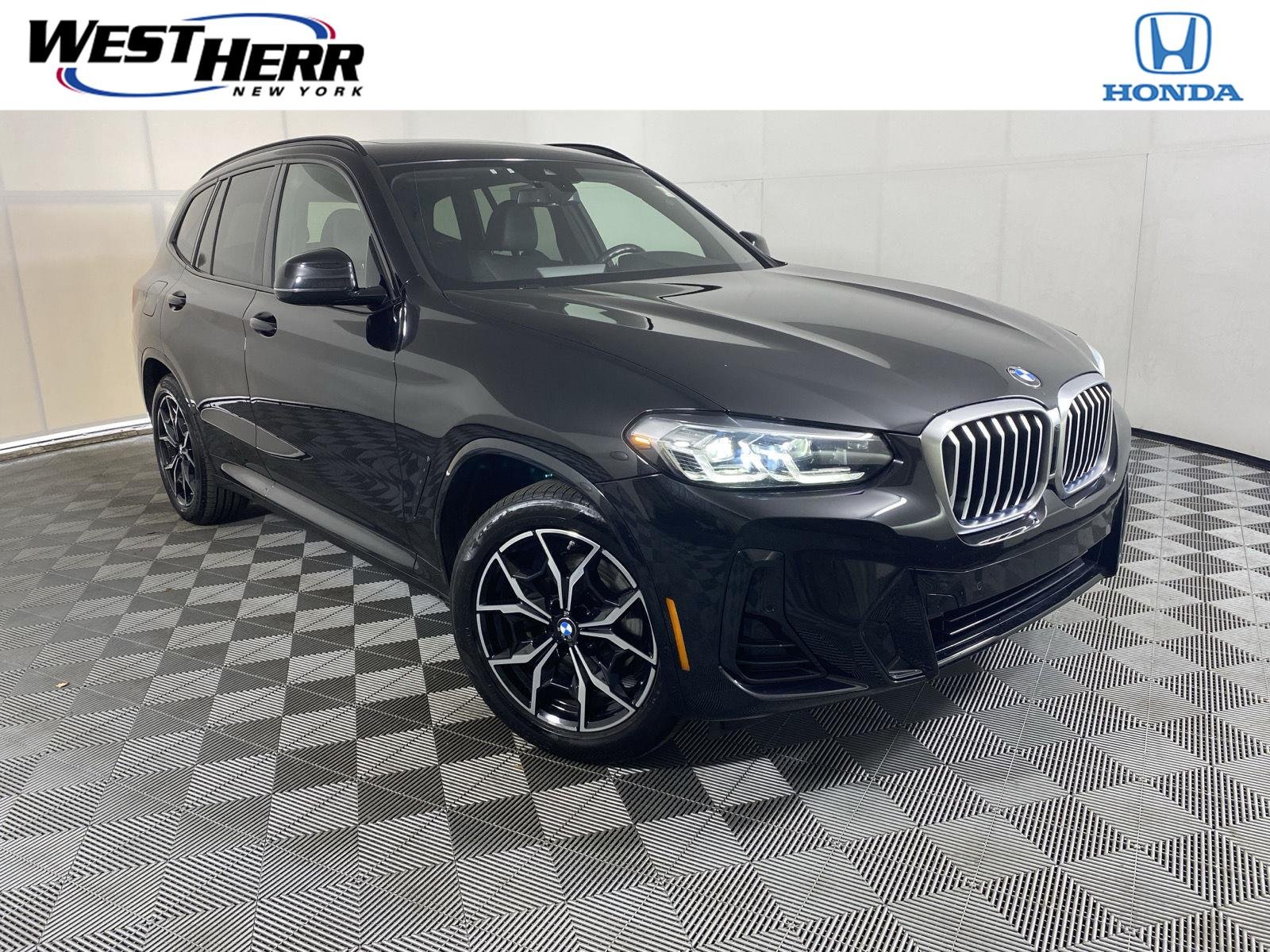 Used 2024 Black Sapphire Metallic BMW xDrive30i image 1