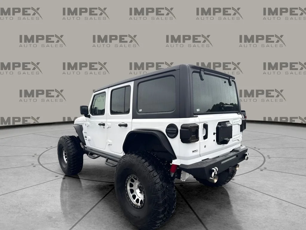 Used 2018 White Jeep Unlimited Sahara image 2