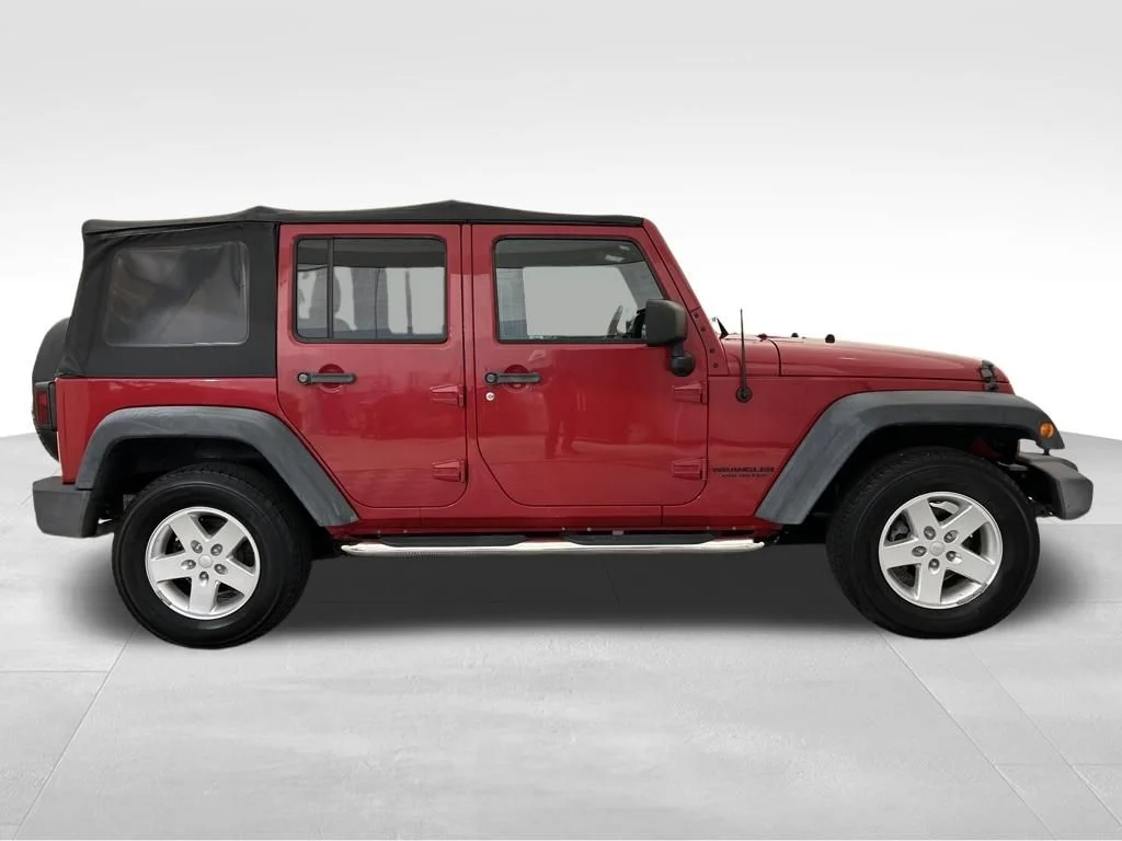 Used 2014 Red Jeep Unlimited Sport image 7