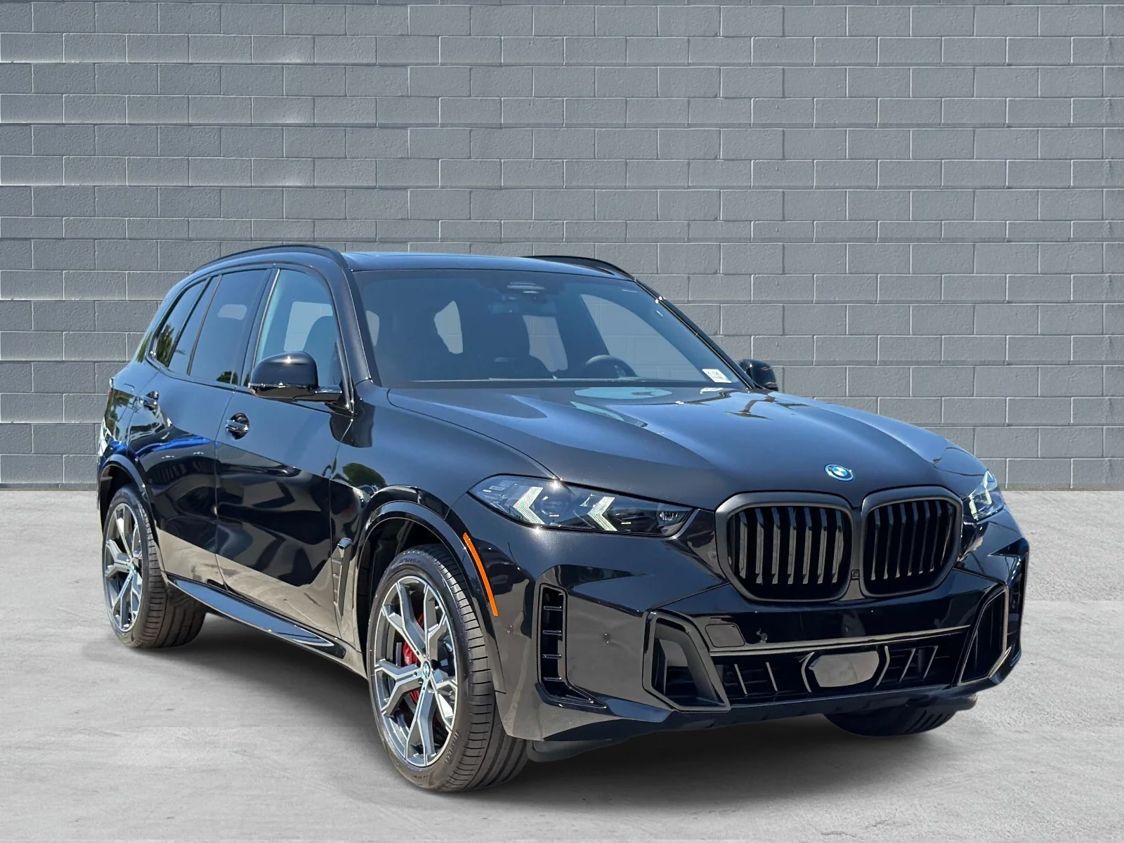 New 2026 Black Sapphire Metallic BMW xDrive50e image 1