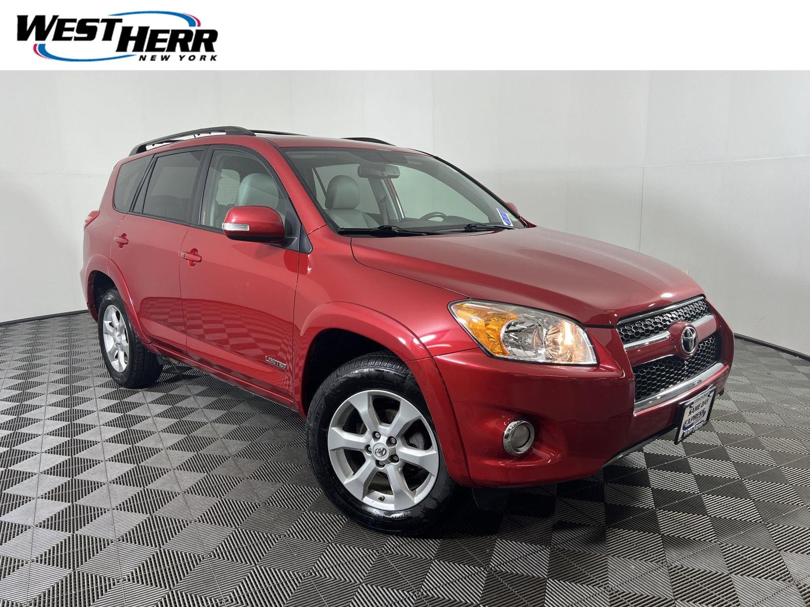 Used 2011 Barcelona Red Metallic Toyota Limited image 1