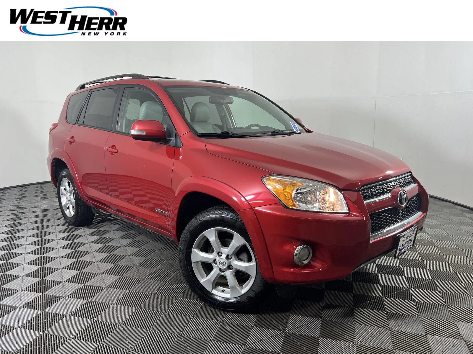 Used 2011 Barcelona Red Metallic Toyota Limited image 1