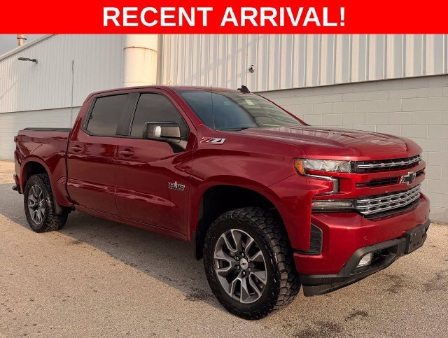 Used 2021 CHERRY RED TINTCOAT Chevrolet RST image 1
