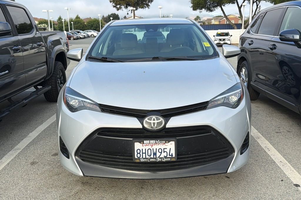 Used 2018 Classic Silver Metallic Toyota LE image 4