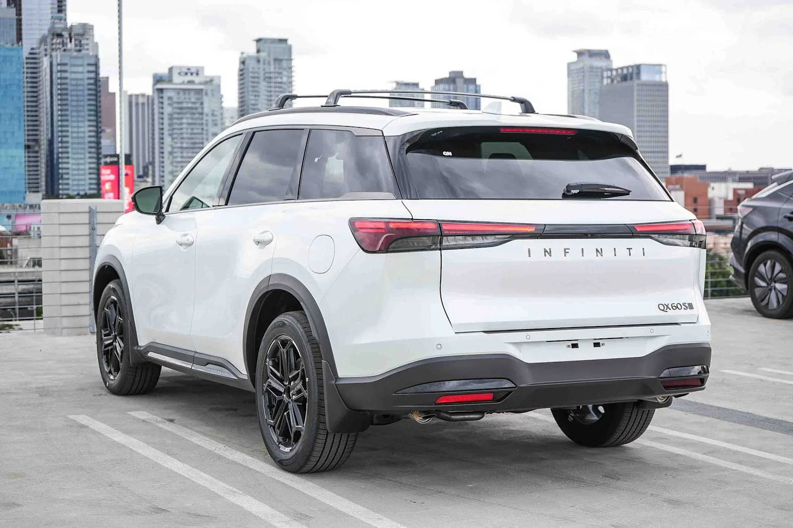 New 2026 RADIANT WHITE INFINITI Sport AWD image 8