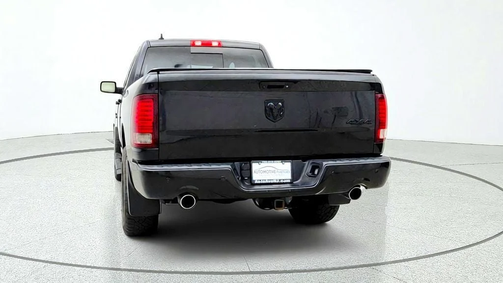 Used 2018 Brilliant Black Crystal Pearlcoat Ram Sport 4x4 Crew Cab 5