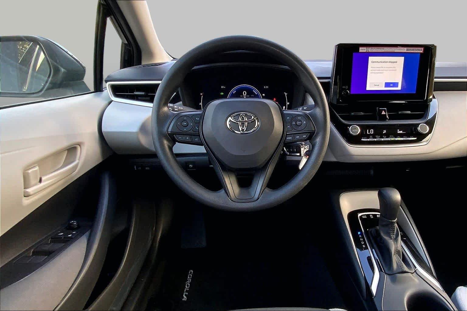 Used 2026 Midnight Black Metallic Toyota Hybrid LE image 6