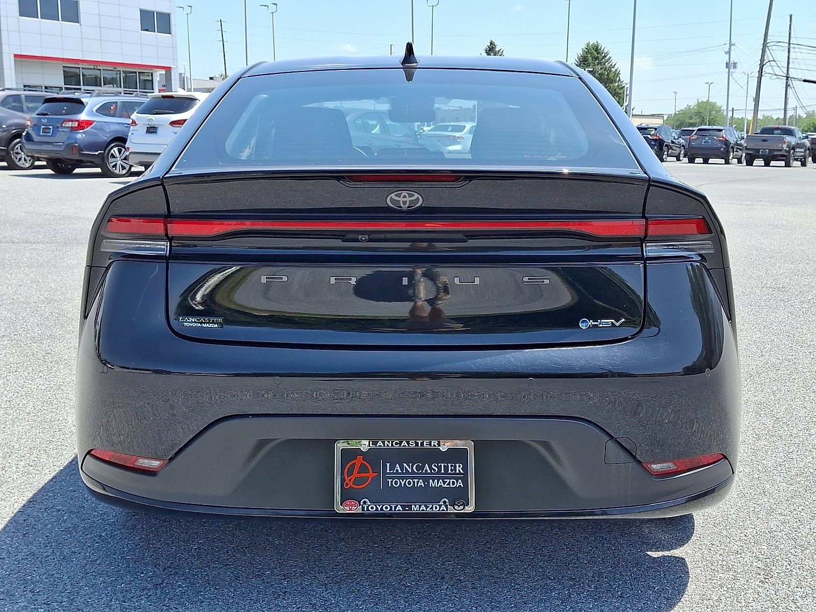 Used 2025 Midnight Black Metallic Toyota LE image 6