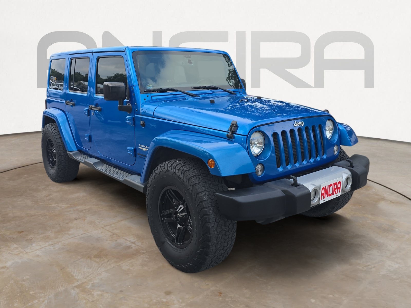 Used 2015 Hydro Blue Pearl Coat Jeep Sahara image 4