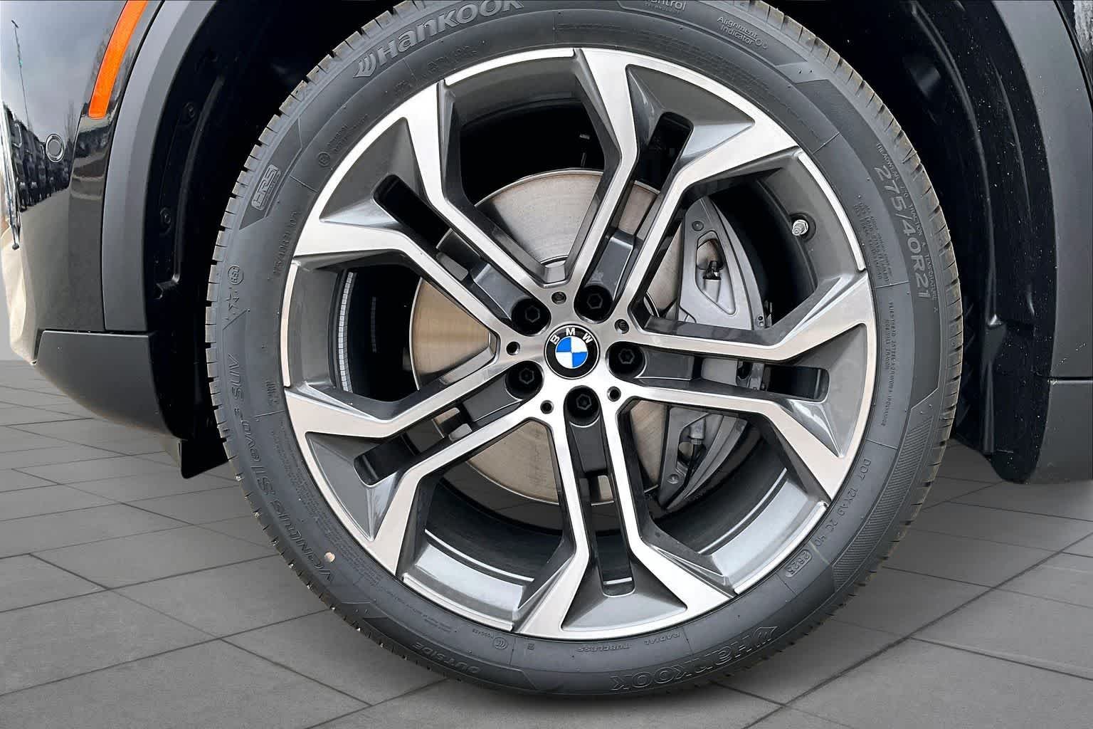 New 2026 Black Sapphire Metallic BMW xDrive50e image 11