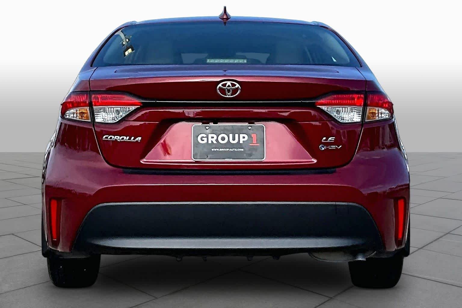 Used 2026 Ruby Flare Pearl Toyota Hybrid LE image 5