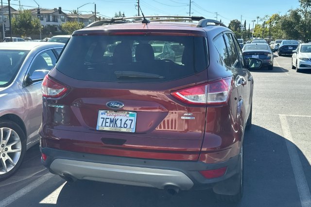 Used 2014 Orange Ford SE image 7