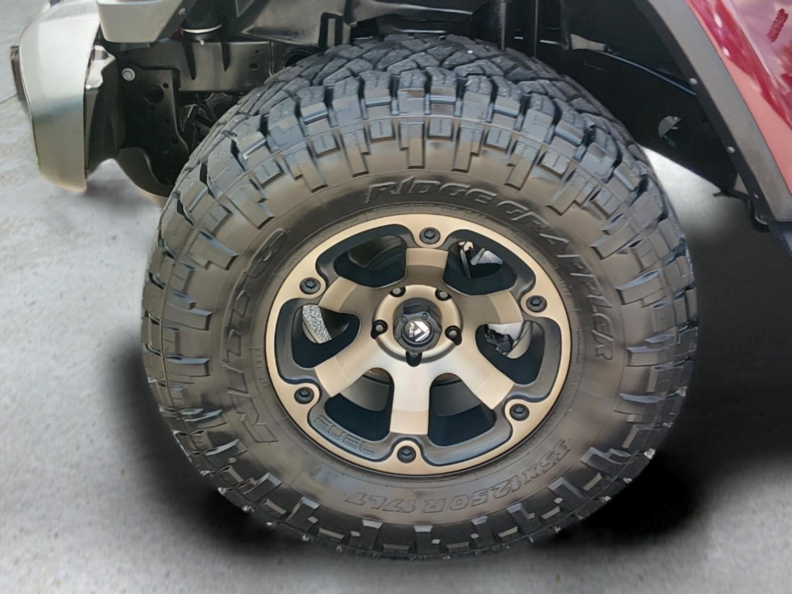 Used 2022 Snazzberry Pearlcoat Jeep Unlimited Sahara image 11
