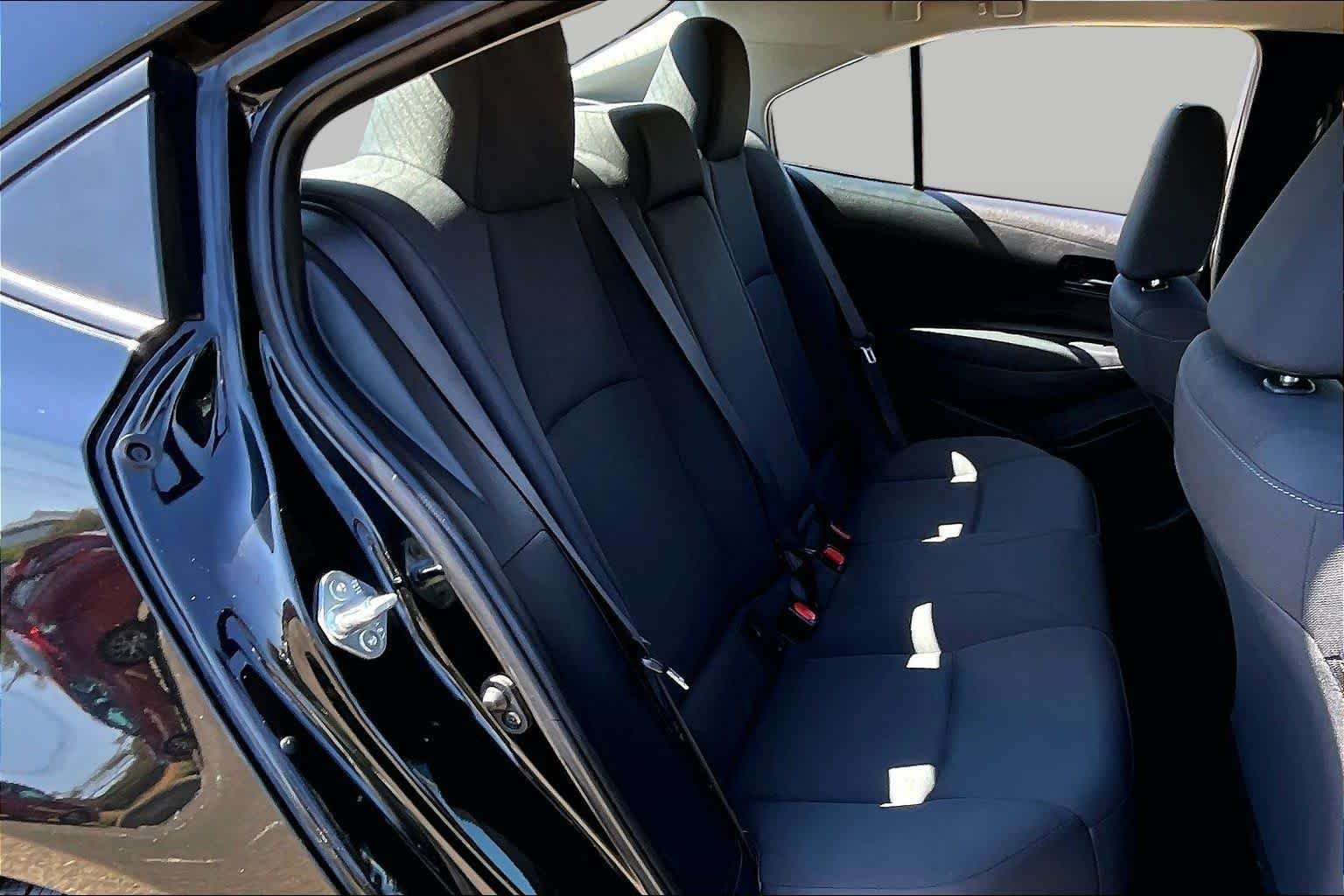 Used 2023 Midnight Black Metallic Toyota LE image 19