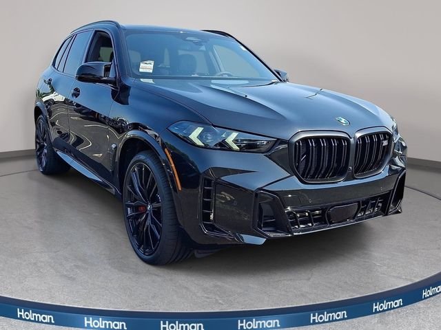 New 2026 Black Sapphire Metallic BMW M60i image 3