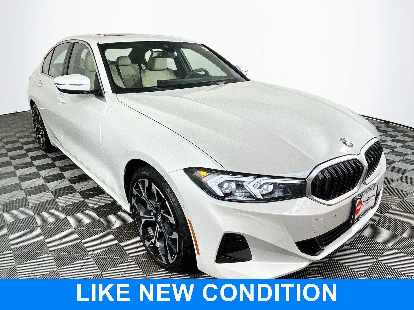 Used 2025 Mineral White Metallic BMW 330i xDrive image 1