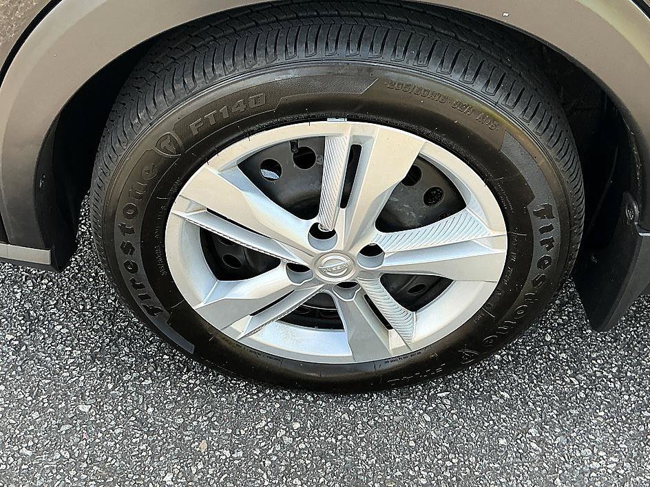 Certified Used 2025 Super Black Nissan S image 8