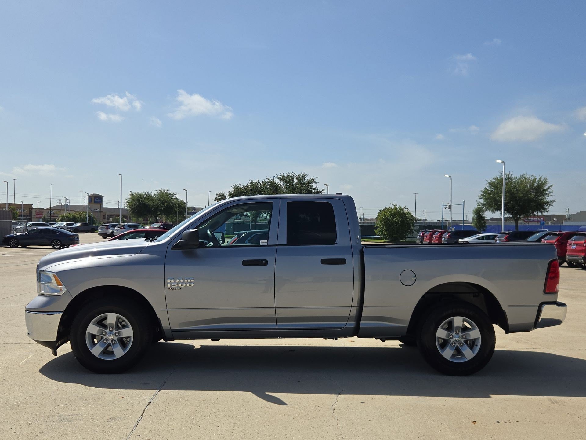 Used 2024 Billet Silver Metallic Clearcoat Ram SLT image 6