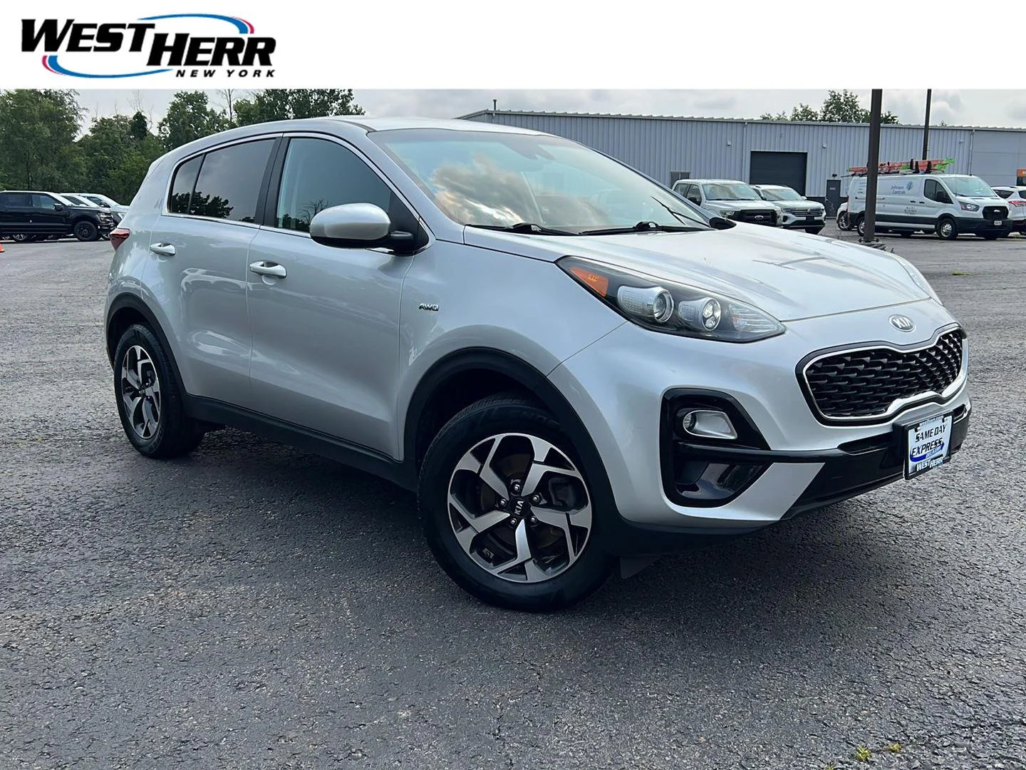 Used 2020 Sparkling Silver Kia LX image 1
