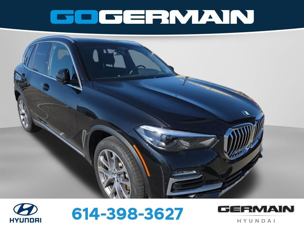 Used 2019 Black BMW xDrive40i image 1