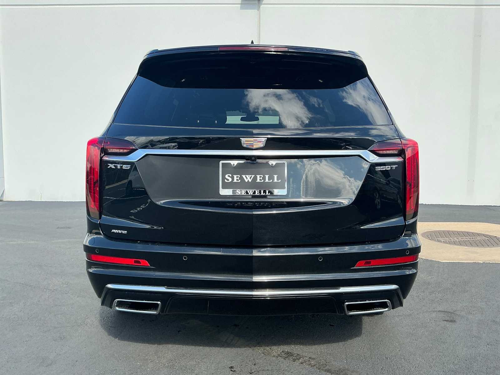 Used 2024 Stellar Black Metallic Cadillac AWD Luxury image 4