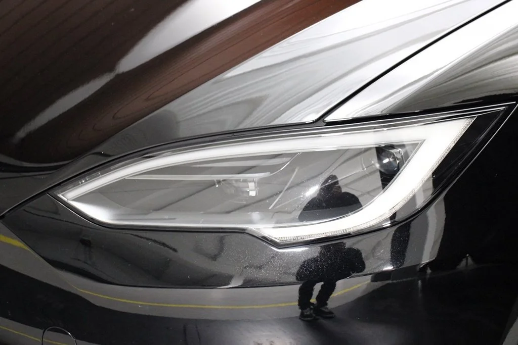 Used 2022 Solid Black Tesla Base image 3