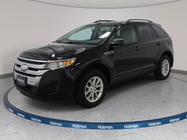 Used 2014 Tuxedo Black Metallic Ford SE image 1