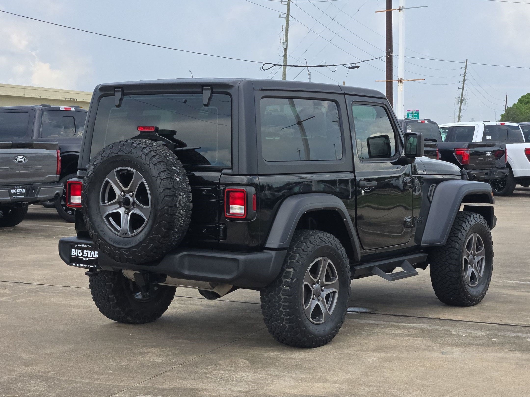 Used 2024 Black Clearcoat Jeep Sport image 3