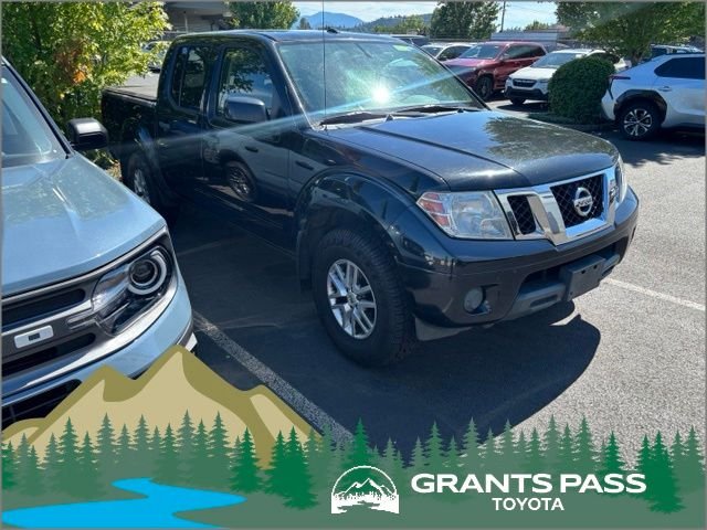 Used 2016 Black Nissan SV image 1