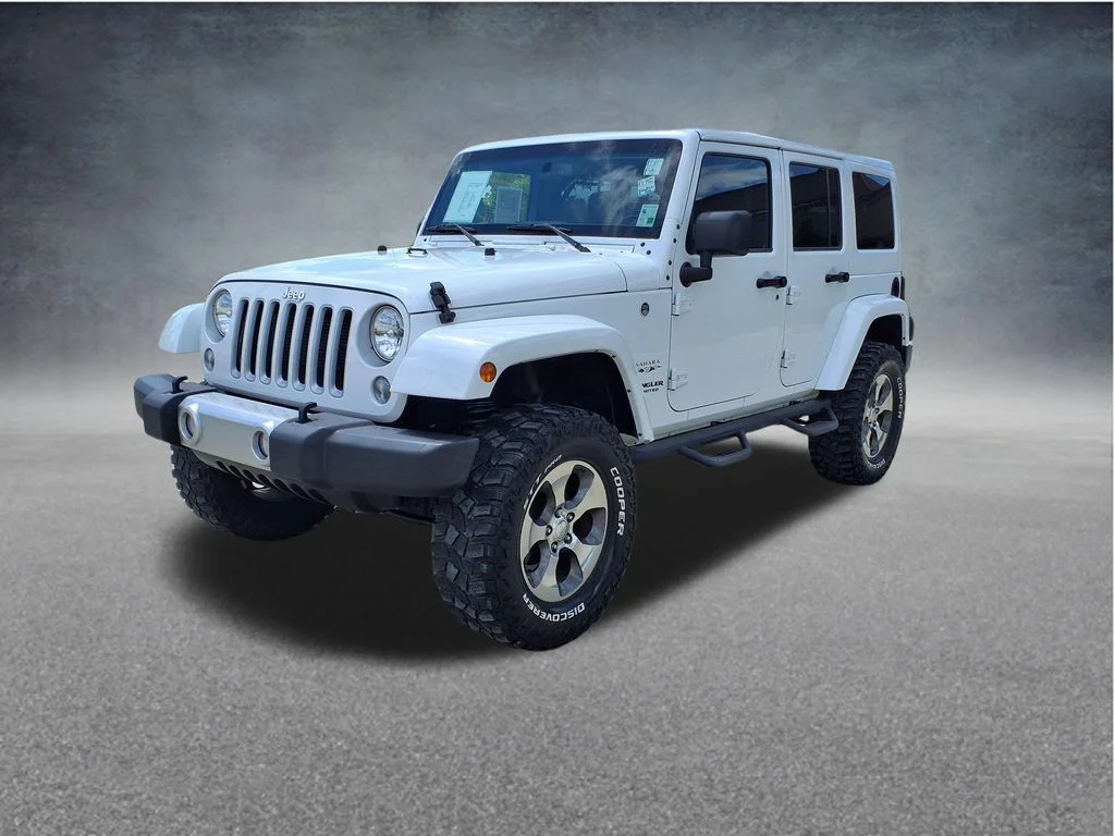Used 2016 White Jeep Unlimited Sahara image 3