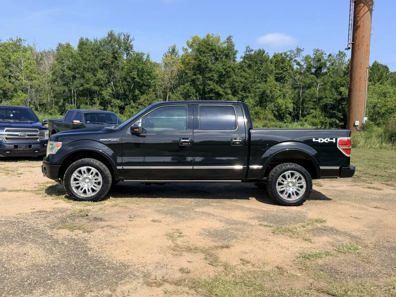 Used 2013 Black Ford Platinum 4x4 4dr SuperCrew Styleside 5.5 ft. SB image 2