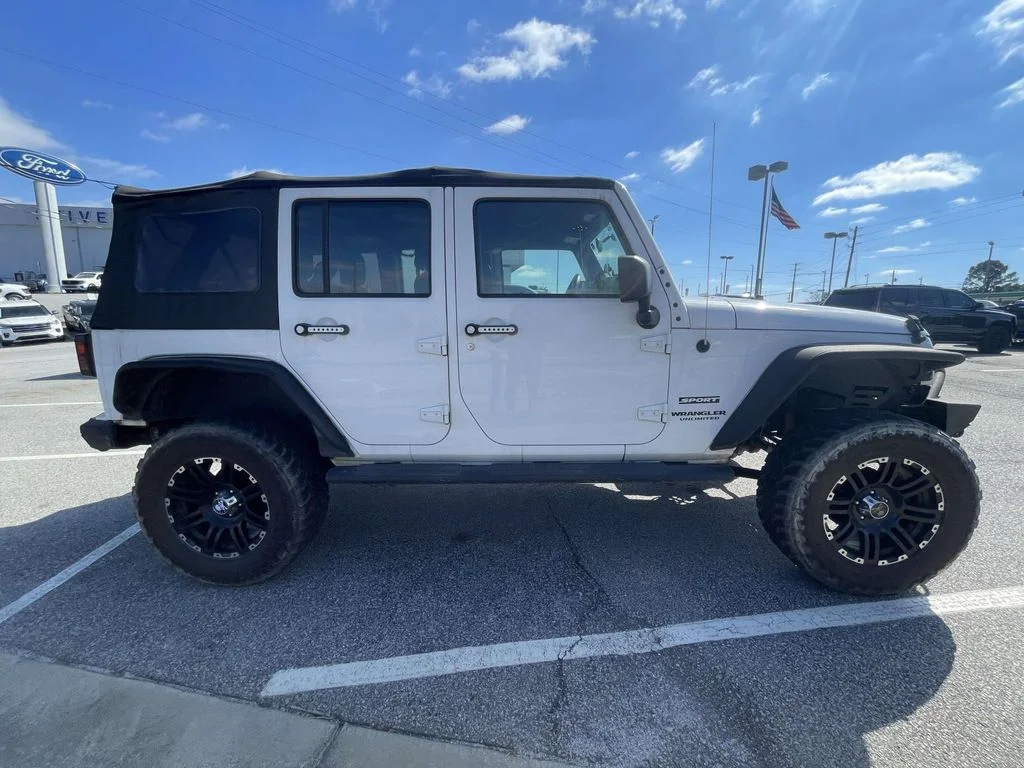 Used 2015 White Jeep Unlimited Sport image 2
