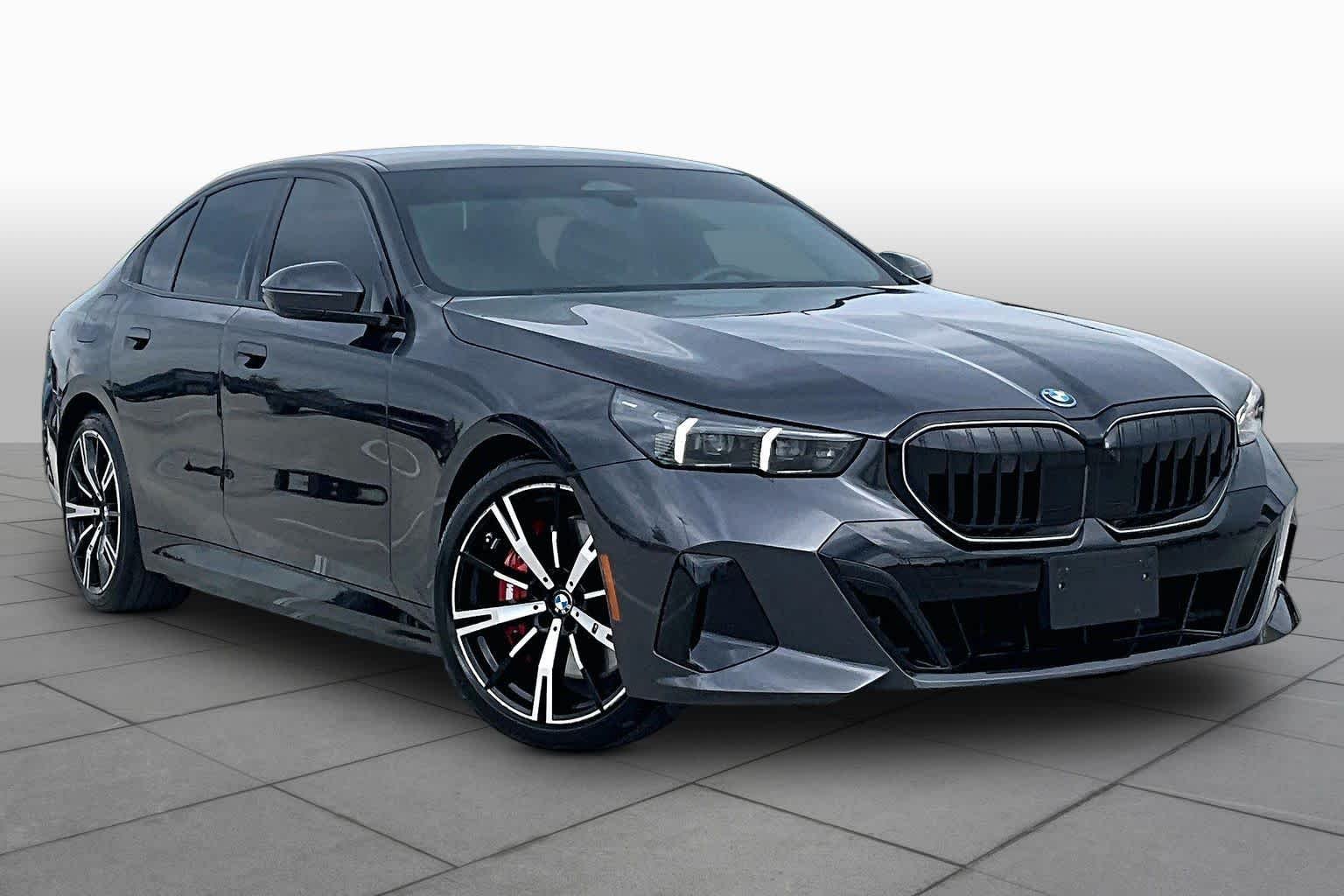 Used 2026 Dark Graphite Metallic BMW 550e xDrive image 2