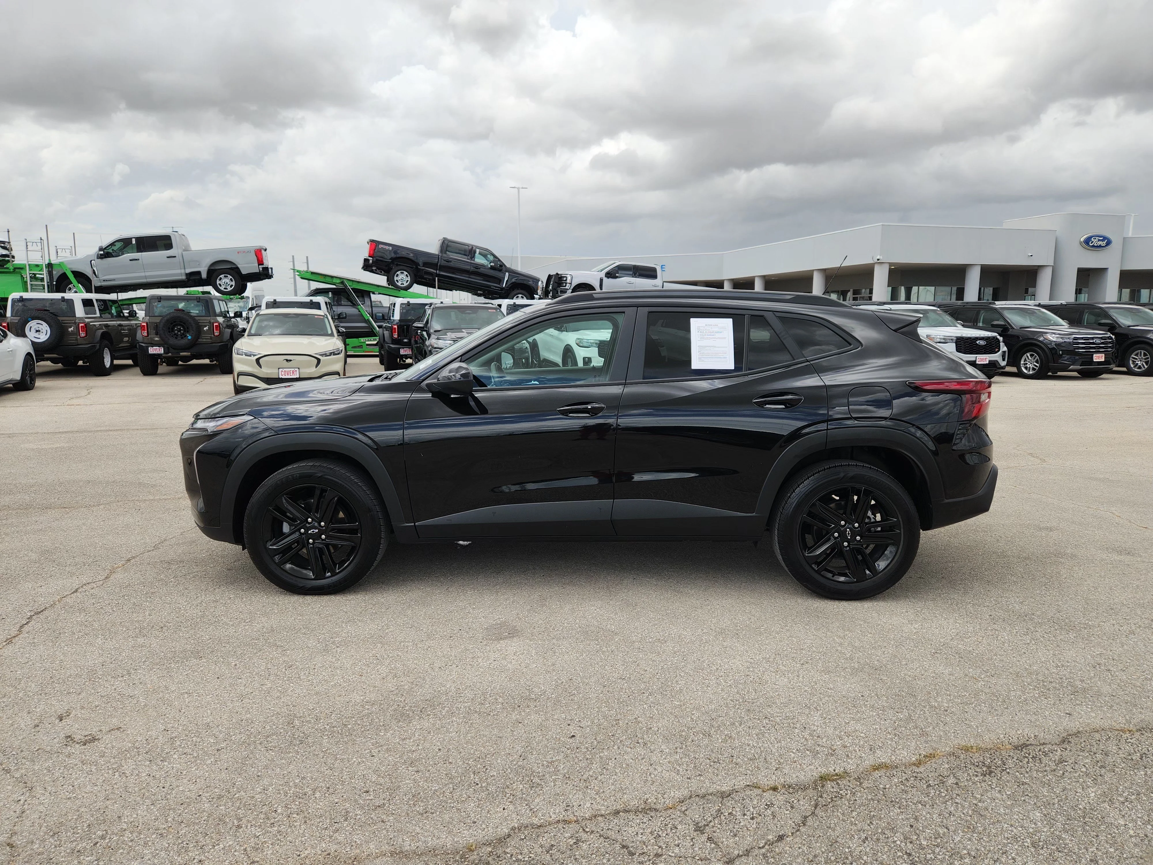 Used 2024 Mosaic Black Metallic Chevrolet ACTIV image 4