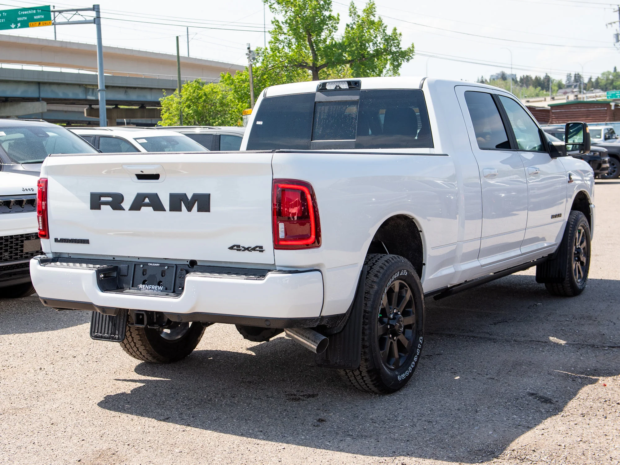 New 2026 White RAM Laramie* image 6