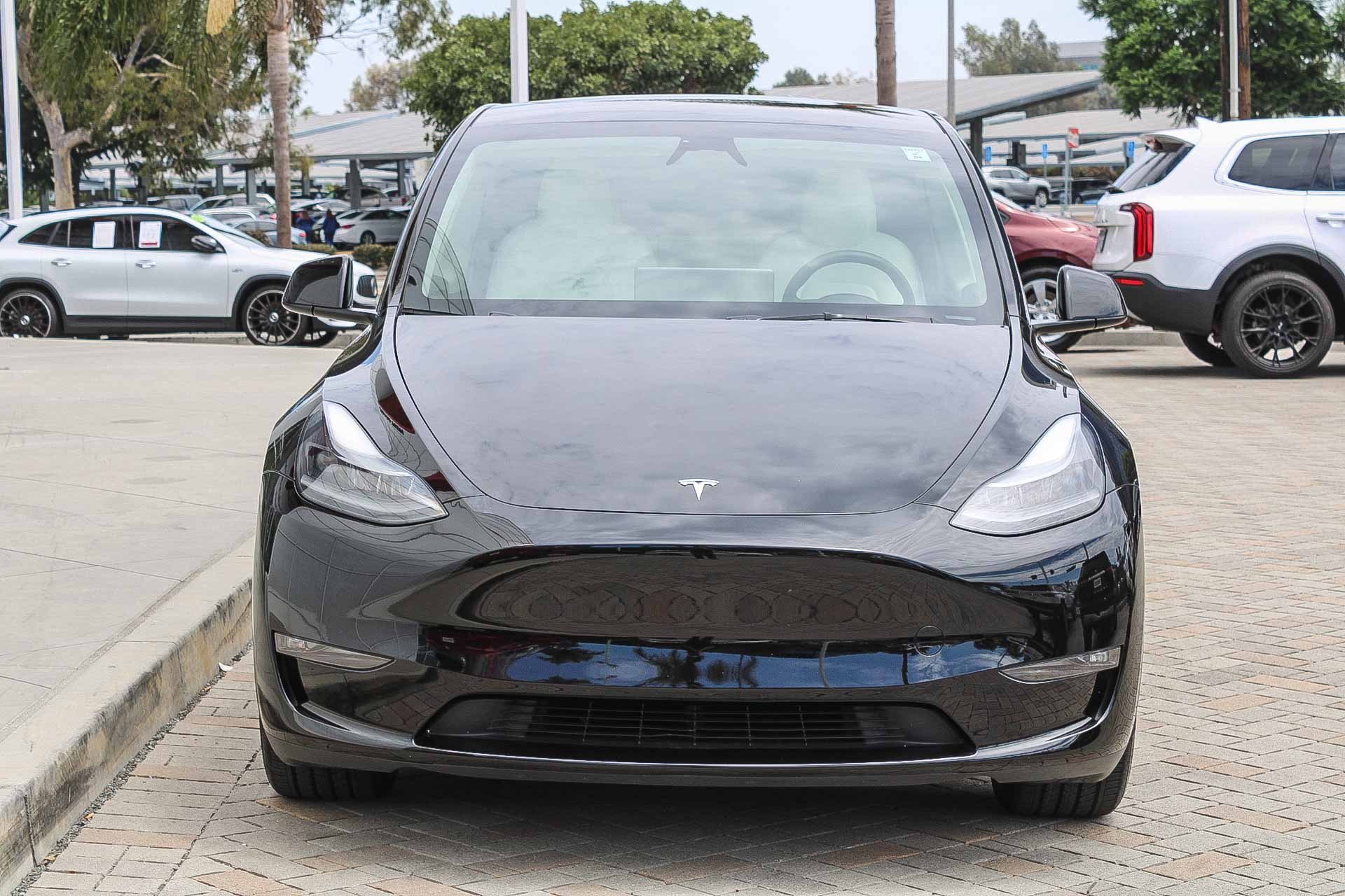Used 2024 Tesla Model Y Long Range with VIN 7SAYGDEE4RF066949 for sale in Long Beach, CA