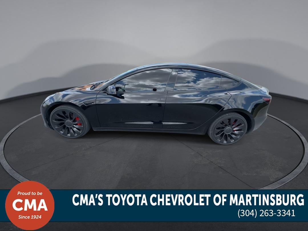 Used 2022 Solid Black Tesla Performance image 5