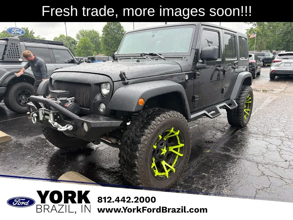 Used 2017 Black Jeep Unlimited Sport image 1