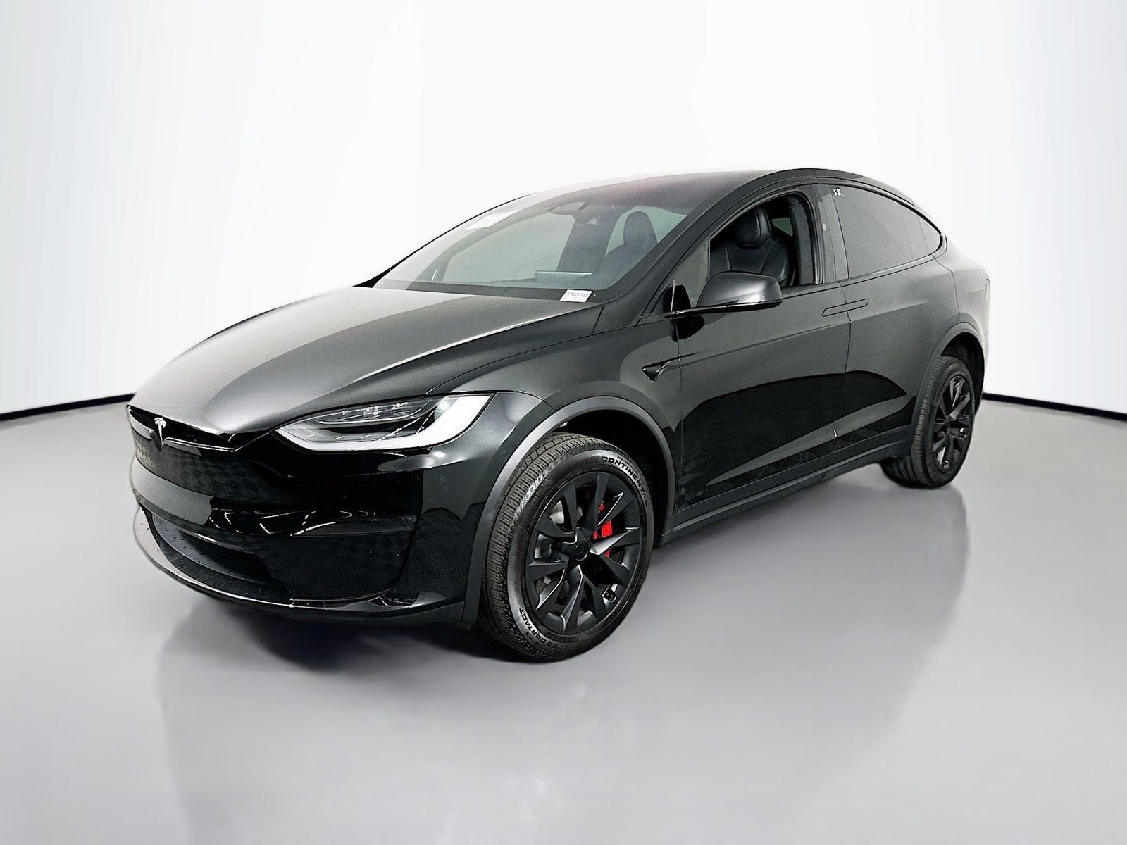 Used 2023 Solid Black Tesla Plaid image 3