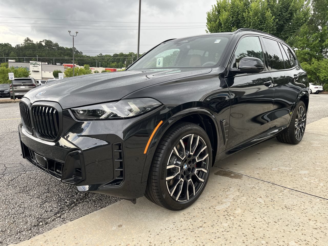 New 2026 Black Sapphire Metallic BMW xDrive40i image 4