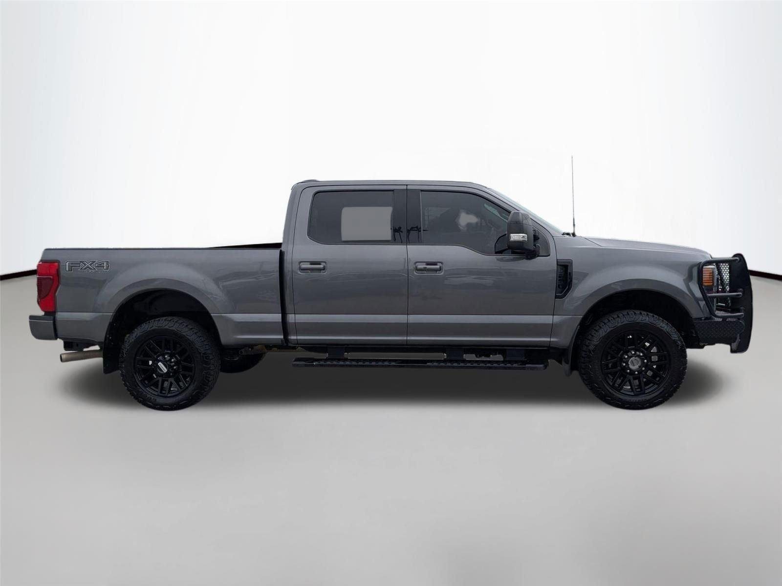 Used 2021 Carbonized Gray Metallic Ford LARIAT image 4