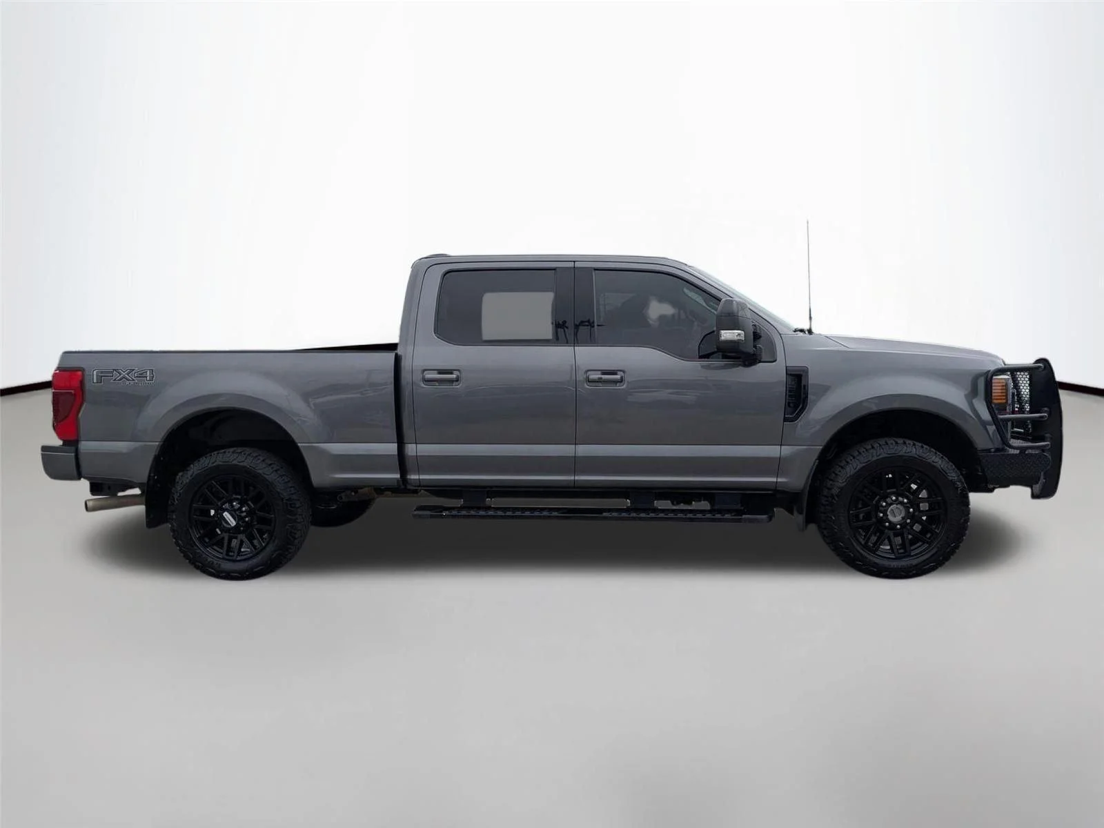 Used 2021 Carbonized Gray Metallic Ford LARIAT image 4