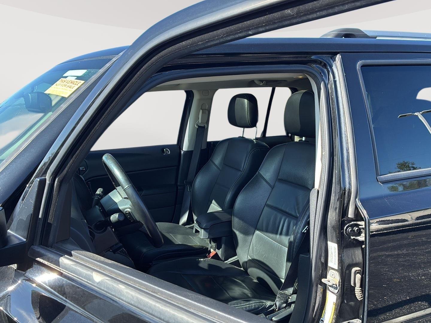 Used 2016 Black Clearcoat Jeep High Altitude Edition image 3