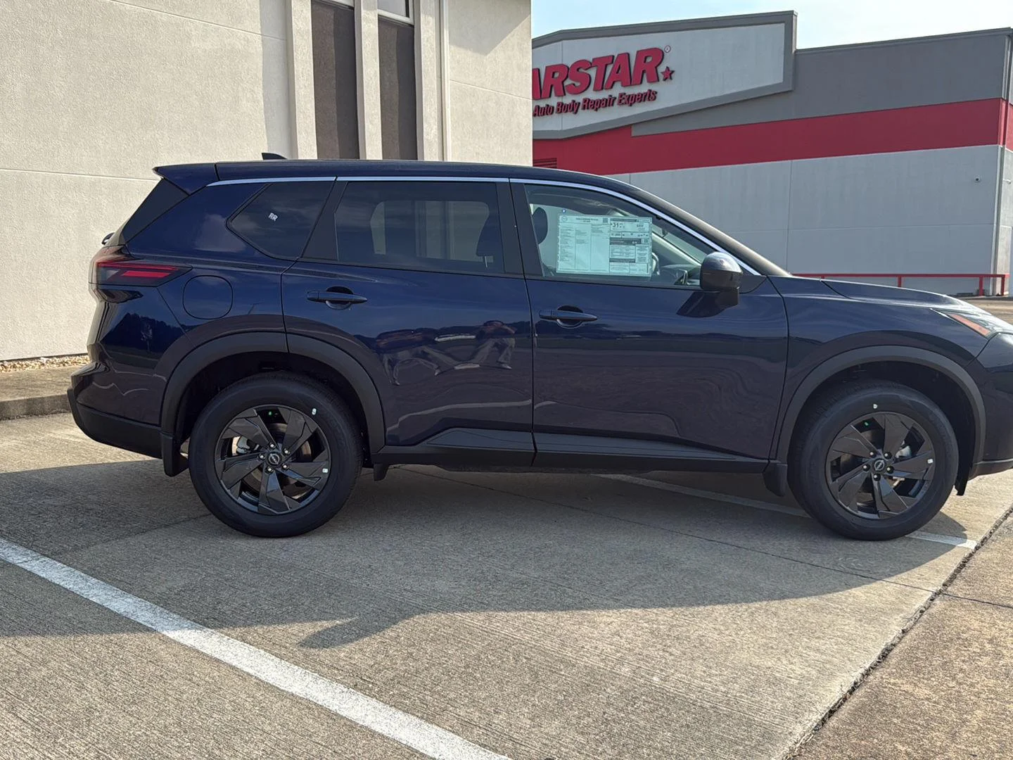 New 2026 Deep Ocean Blue Pearl Nissan SV image 8