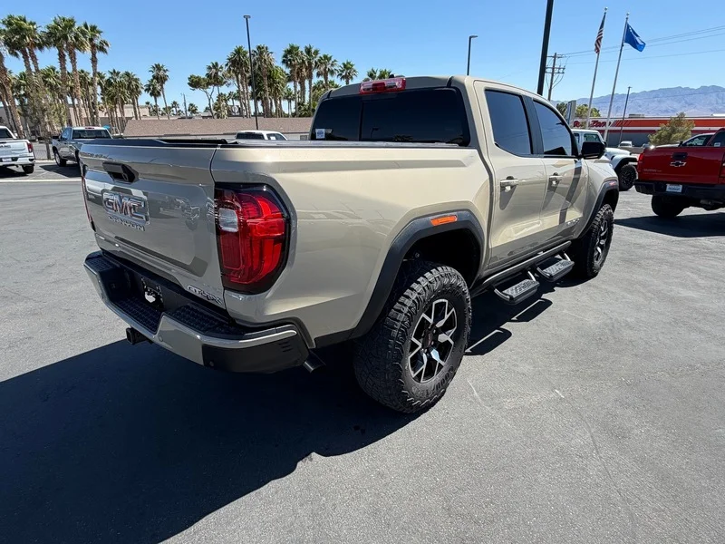 Used 2024 Desert Sand Metallic GMC AT4X image 3