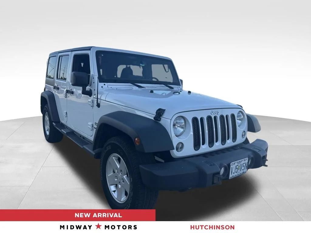 Used 2014 White Jeep Unlimited Sport image 1