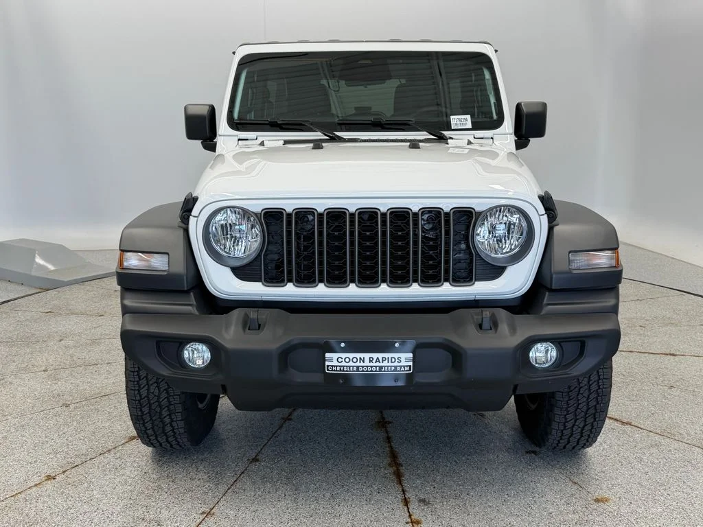 Used 2026 Jeep Wrangler 4-Door Sport S with VIN 1C4PJXDG7TW207949 for sale in Coon Rapids, Minnesota