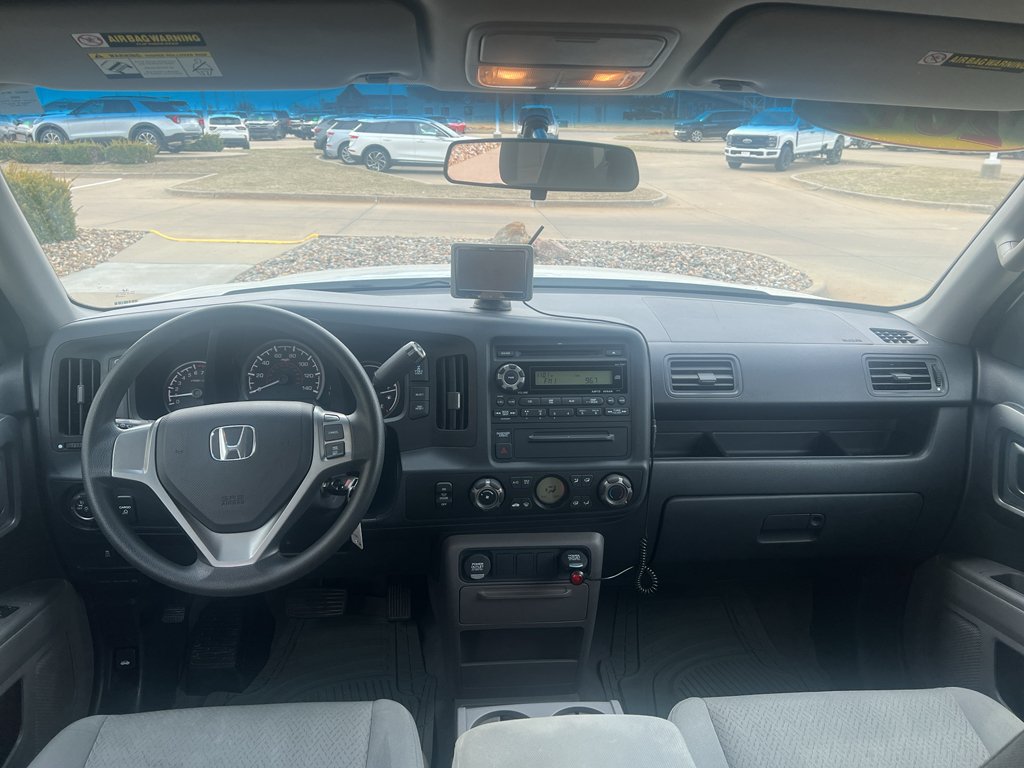 Used 2012 Honda Ridgeline RT with VIN 5FPYK1F21CB003756 for sale in Pella, IA